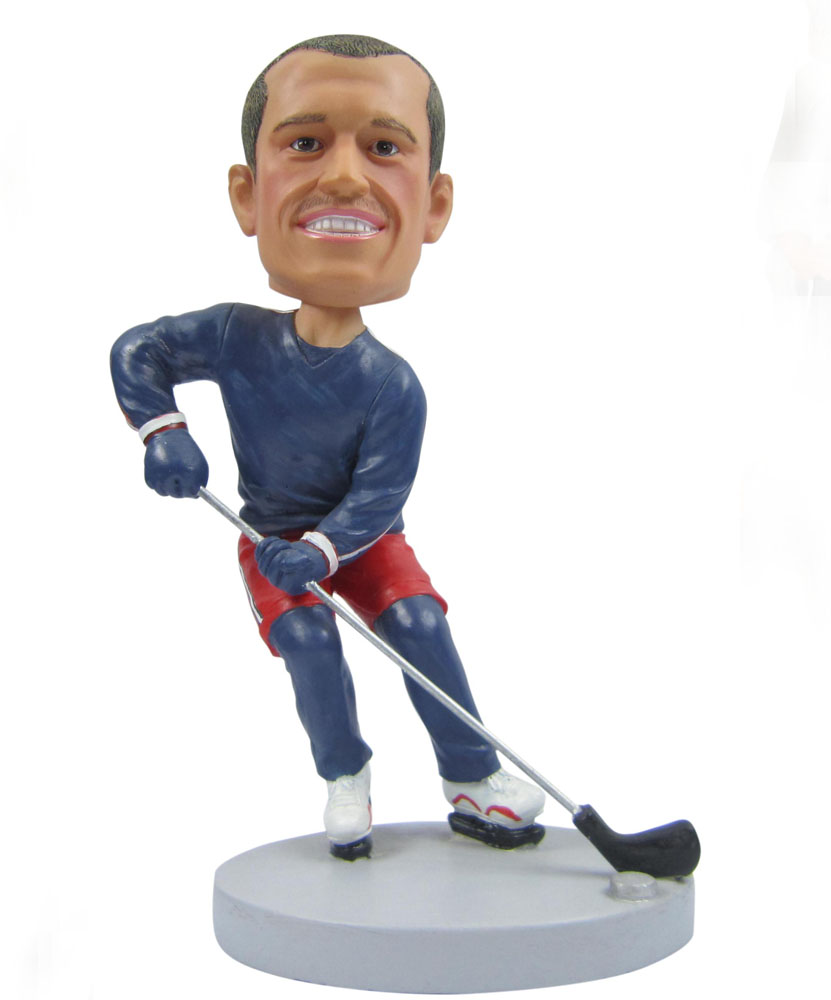 hockey bobblehead with blue and red uniform G035