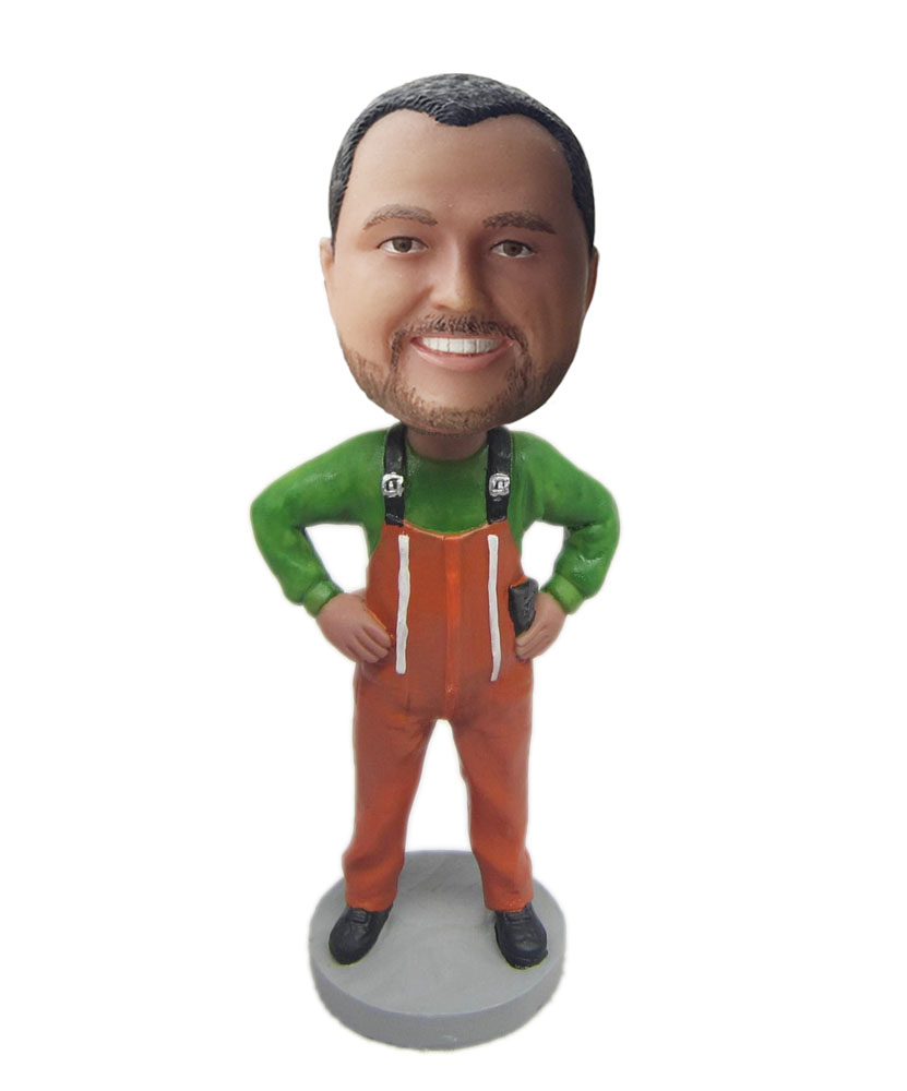 Male custom dolls with green coat and orange suspenders