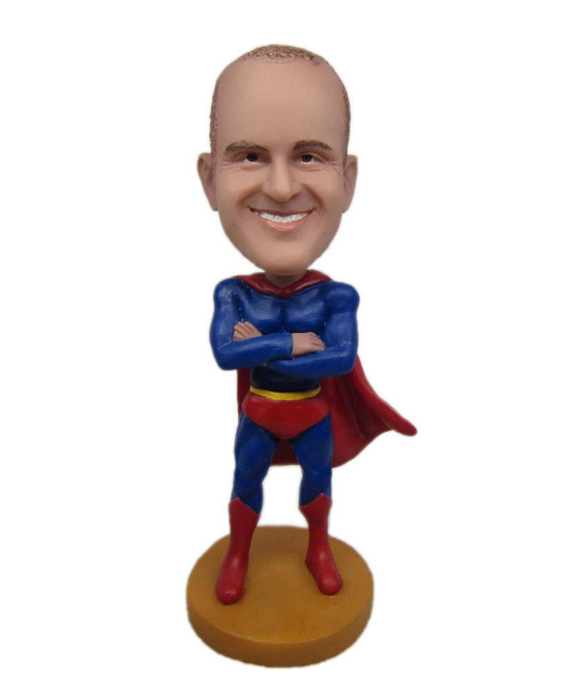 Superman bobblehead with blue superman clothes