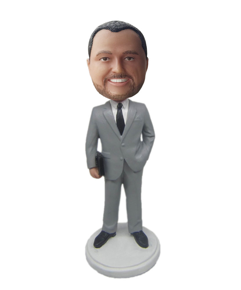 Custom made figurines dressed in gray suit