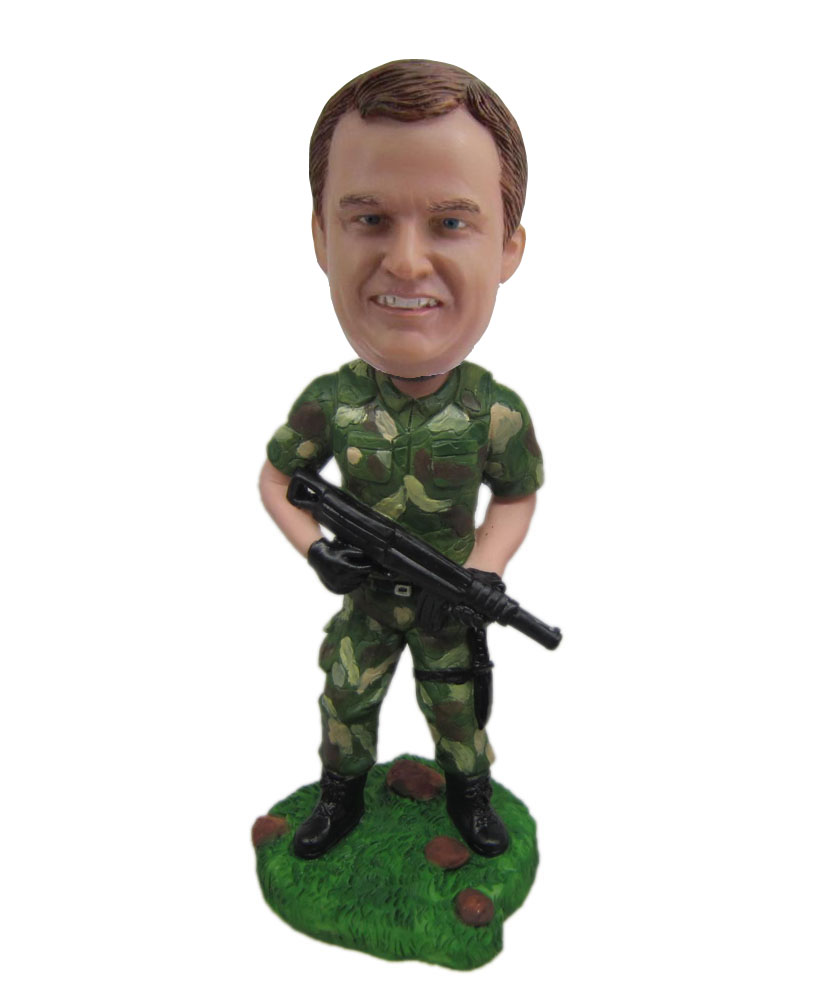 Personal bobbleheads of soldier with camouflage uniform