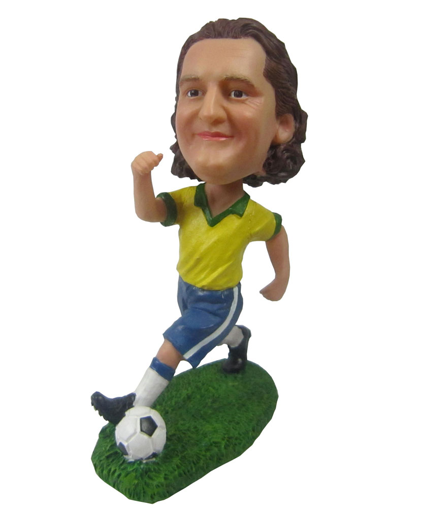 Soccer bobbleheads with yellow jacket and blue shorts