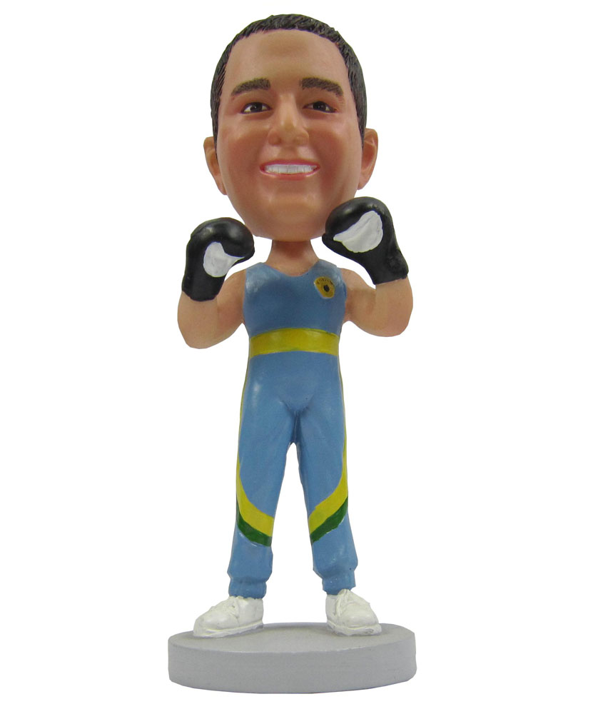 Sport bobbleheads dressed in blue jumpsuit