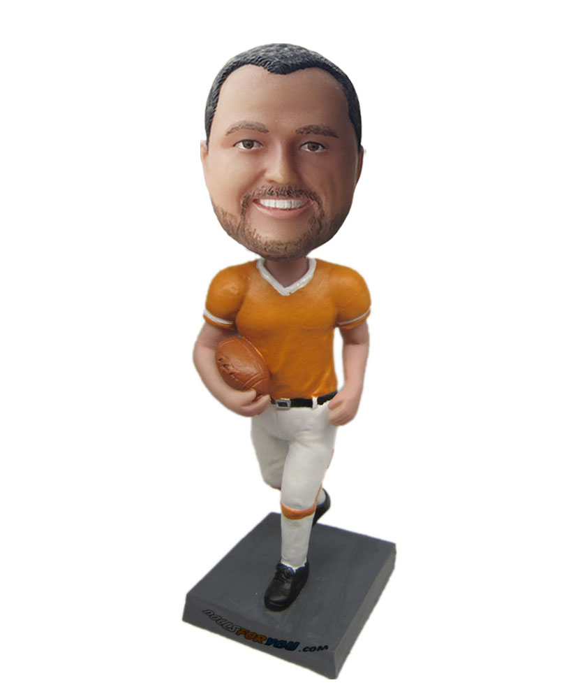 Customized bobbleheads of kid with yellow shirt and white trousers