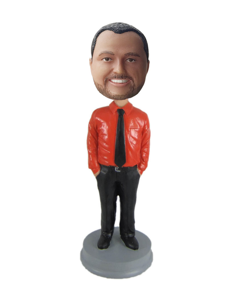 Personalized bobblehead dolls dressed in orange shirt and black trousers