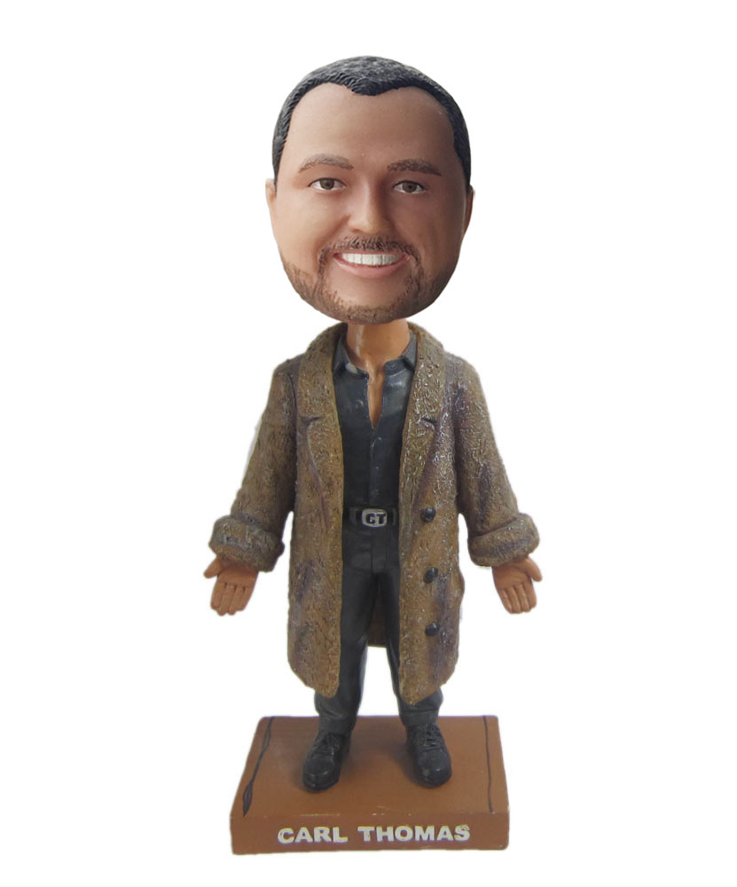 Male bobblehead with blown overcoat