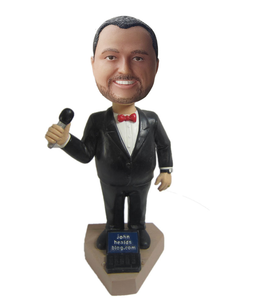 Custom bobblehead doll of male singer with black dress