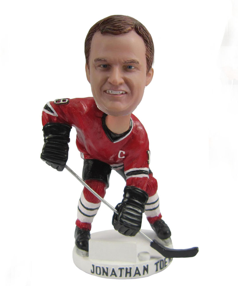 Custom hockey player with stick man bobble doll