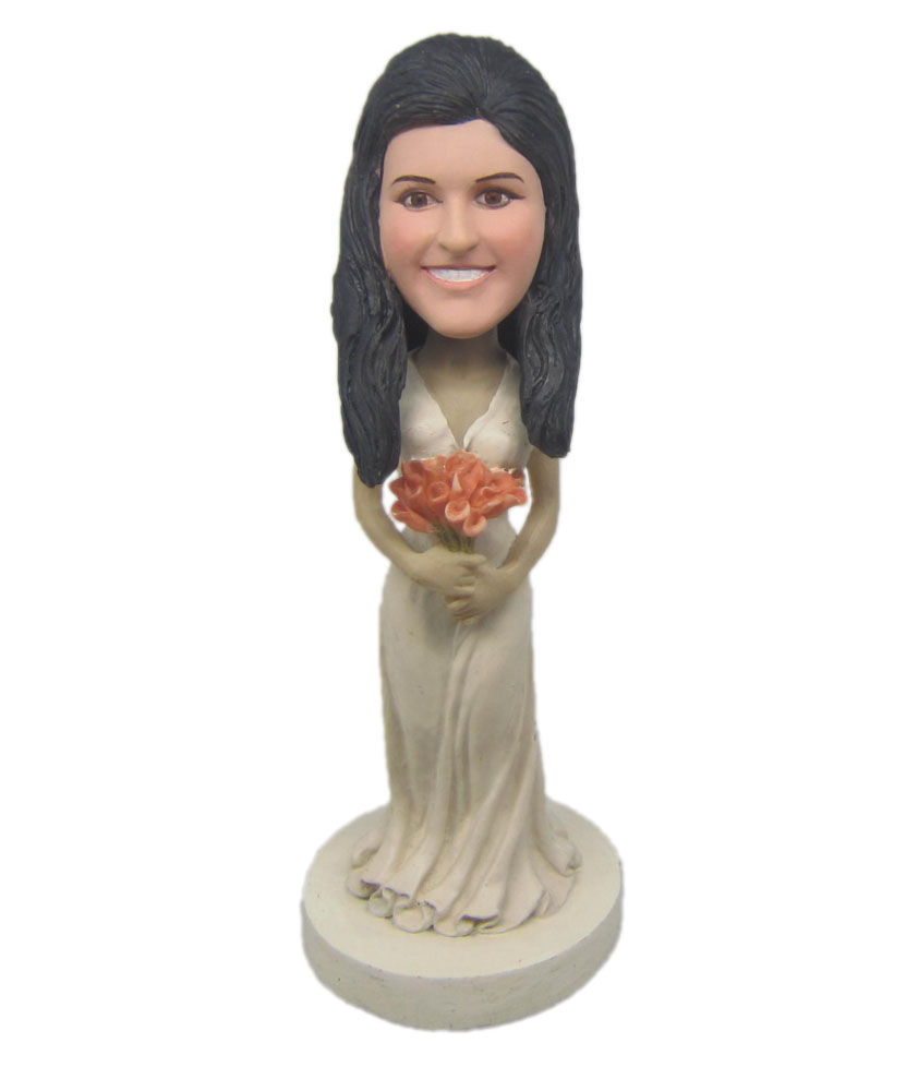 Princess bobblehead with white long dress and flowers on hands