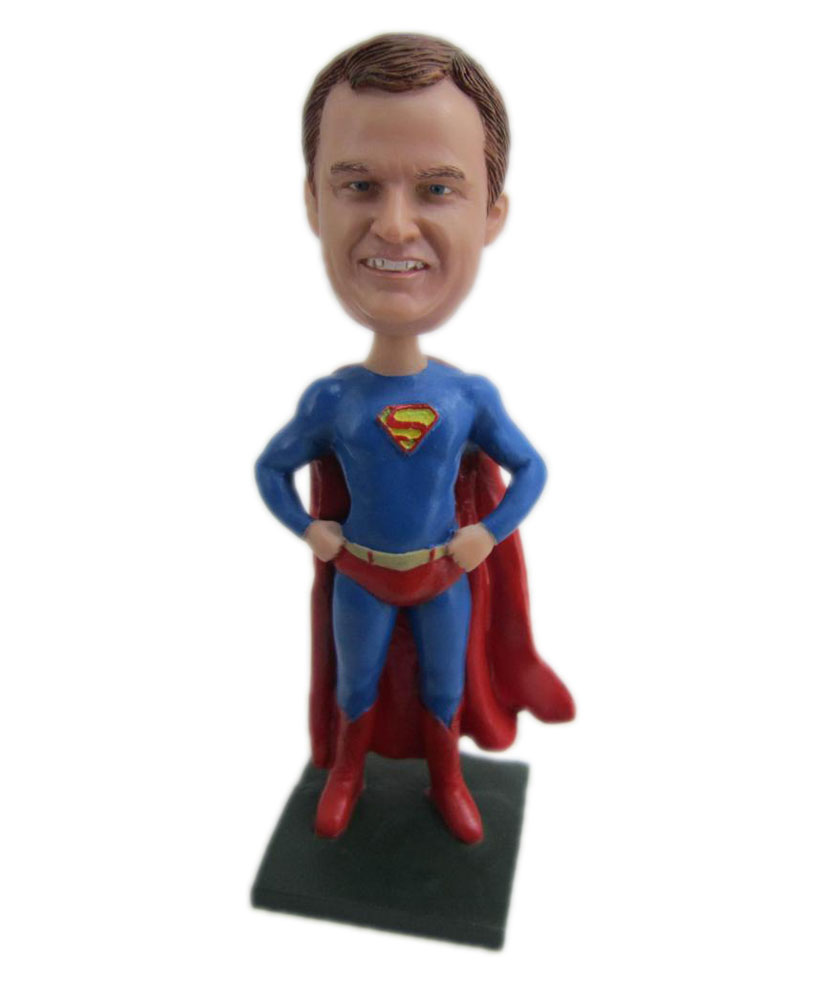 Superman bobblehead with hands on waist
