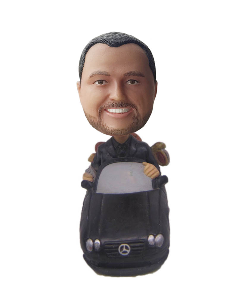 Handsome guy bobblehead with benz car