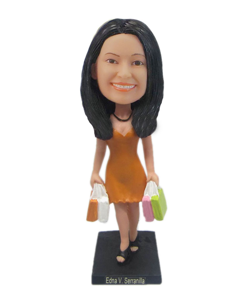 Female holding shopping bag Bobbleheads doll