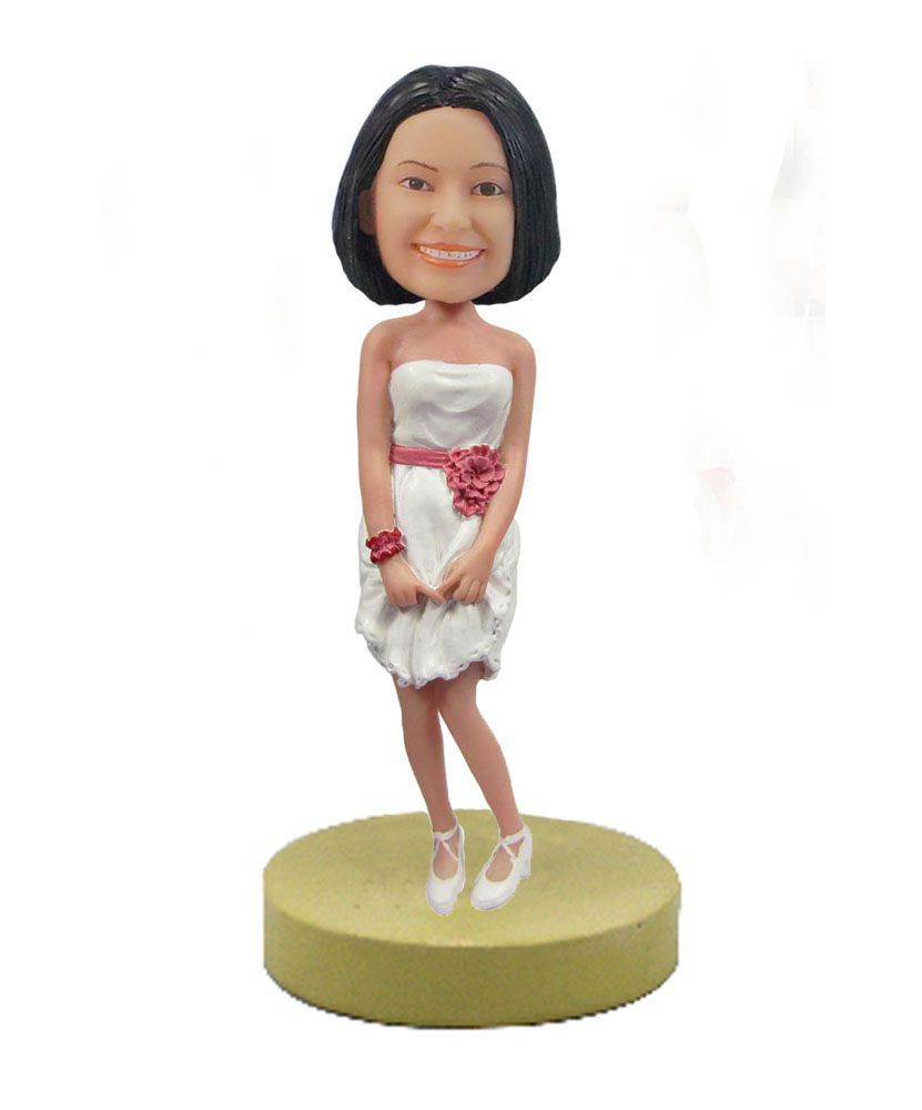 Female wearing white dress bobblehead doll F42