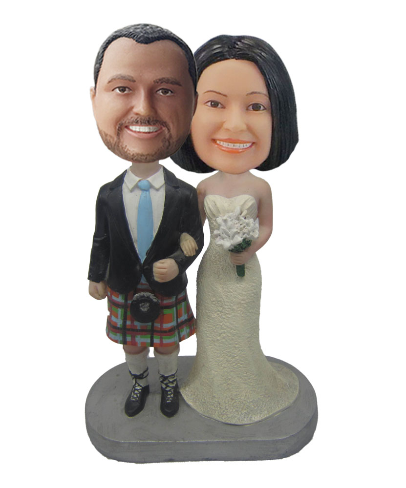 Groom In Black Suit And Bride In White Wedding Dress Handing A Bunch Of Flowers Bobblehead W618