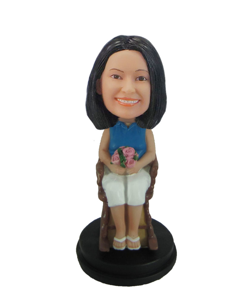 Mother bobblehead Holding flowers on the chair F124