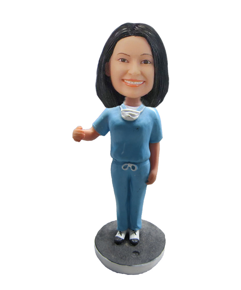 Female nurse in Blue Smiling angel bobblehead F125