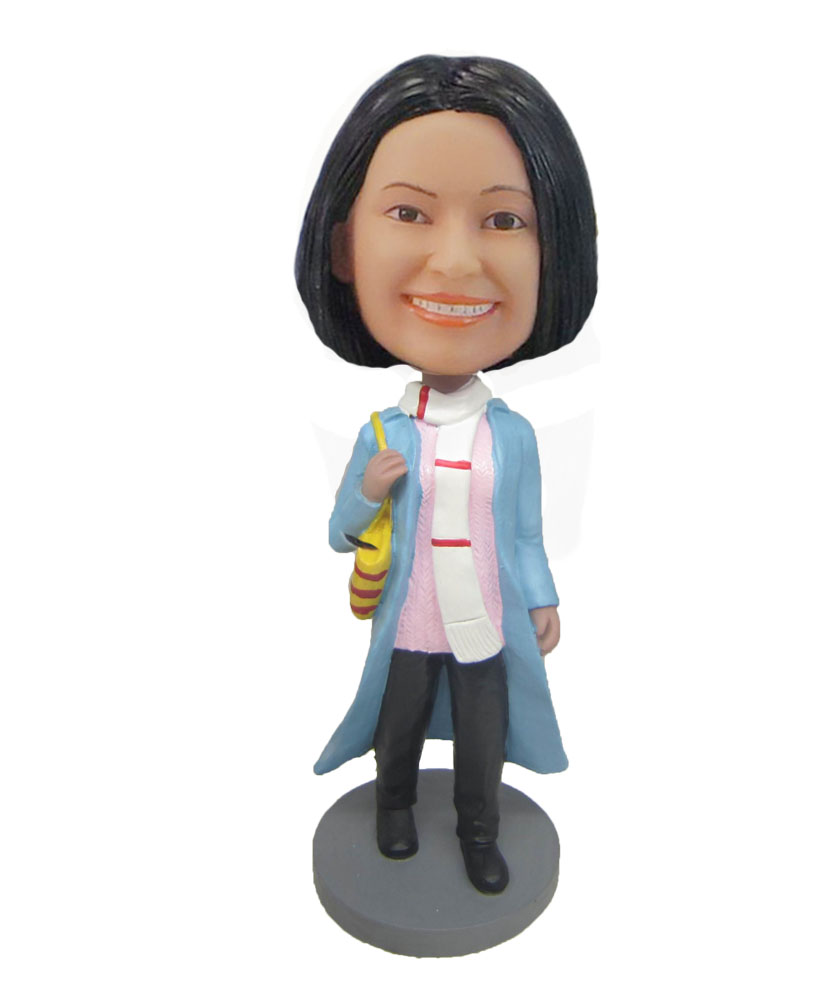 Shopping mother in blue coat bobblehead doll F825